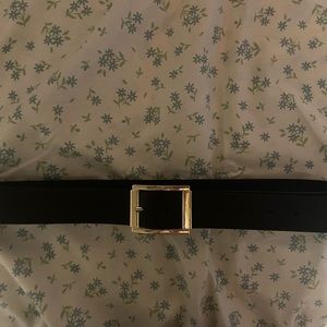 Black belt gold buckle